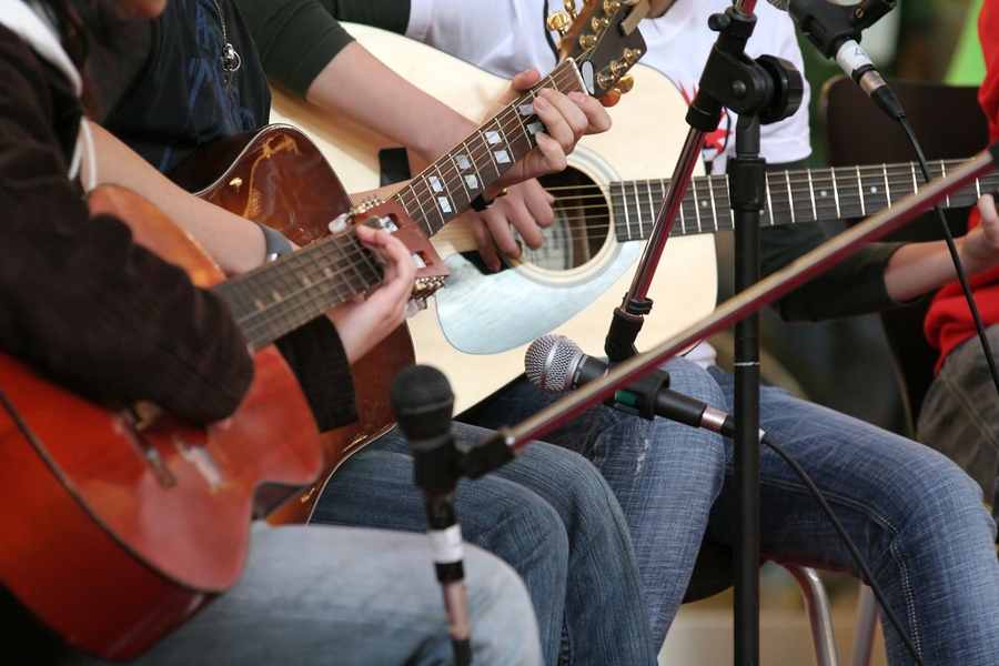 How to play guitar with a band or group