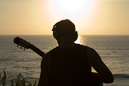 guitar player listening to music